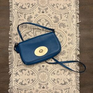 Aquamarine Coach purse with gold accents in pristine condition